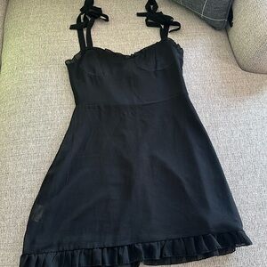 Black tie strap, ruffle hem dress